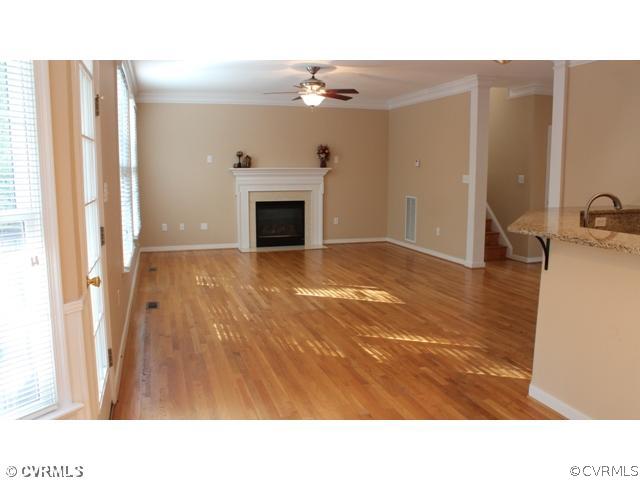 839 Club Ridge Court Chester, VA 23836 - Photo 8 of 24 a open hall with a fireplace