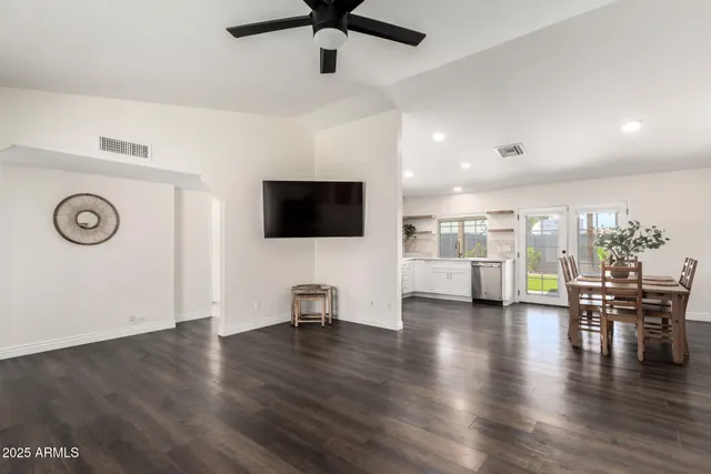 a view of kitchen with furniture and wooden floor
