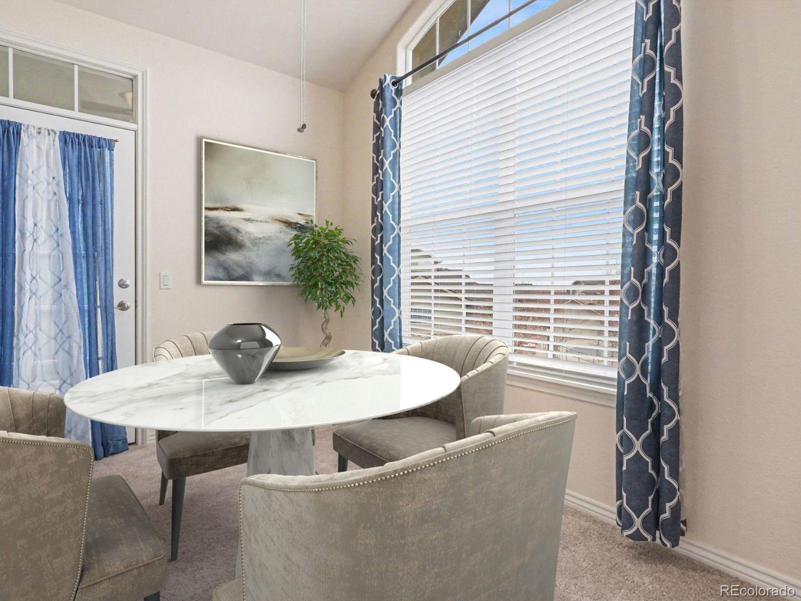 18611 Stroh Road, Unit 5208 Parker, CO 80134 - Photo 9 of 27 a view of a dining room with furniture and window