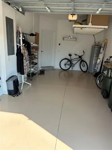 a workspace with furniture and bathroom