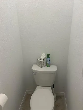 a view of a room that has a window in it