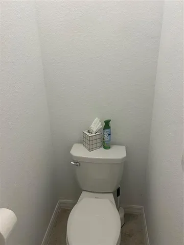 a view of a room that has a window in it