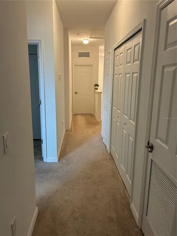 a bathroom with a double vanity sink and mirror