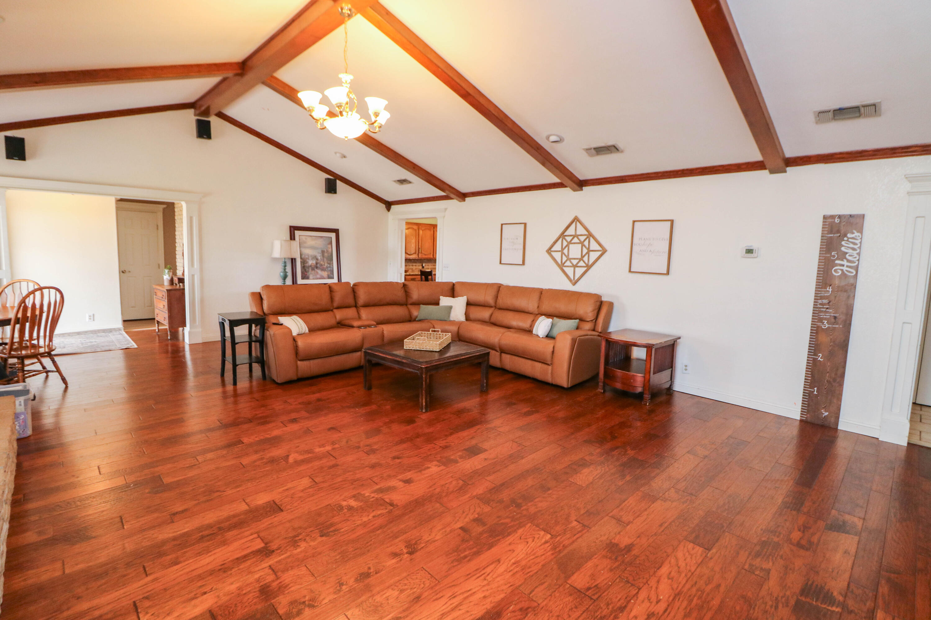 1740 Highway 70 Springlake, TX 79082 - Photo 5 of 39 a living room with furniture and a wooden floor