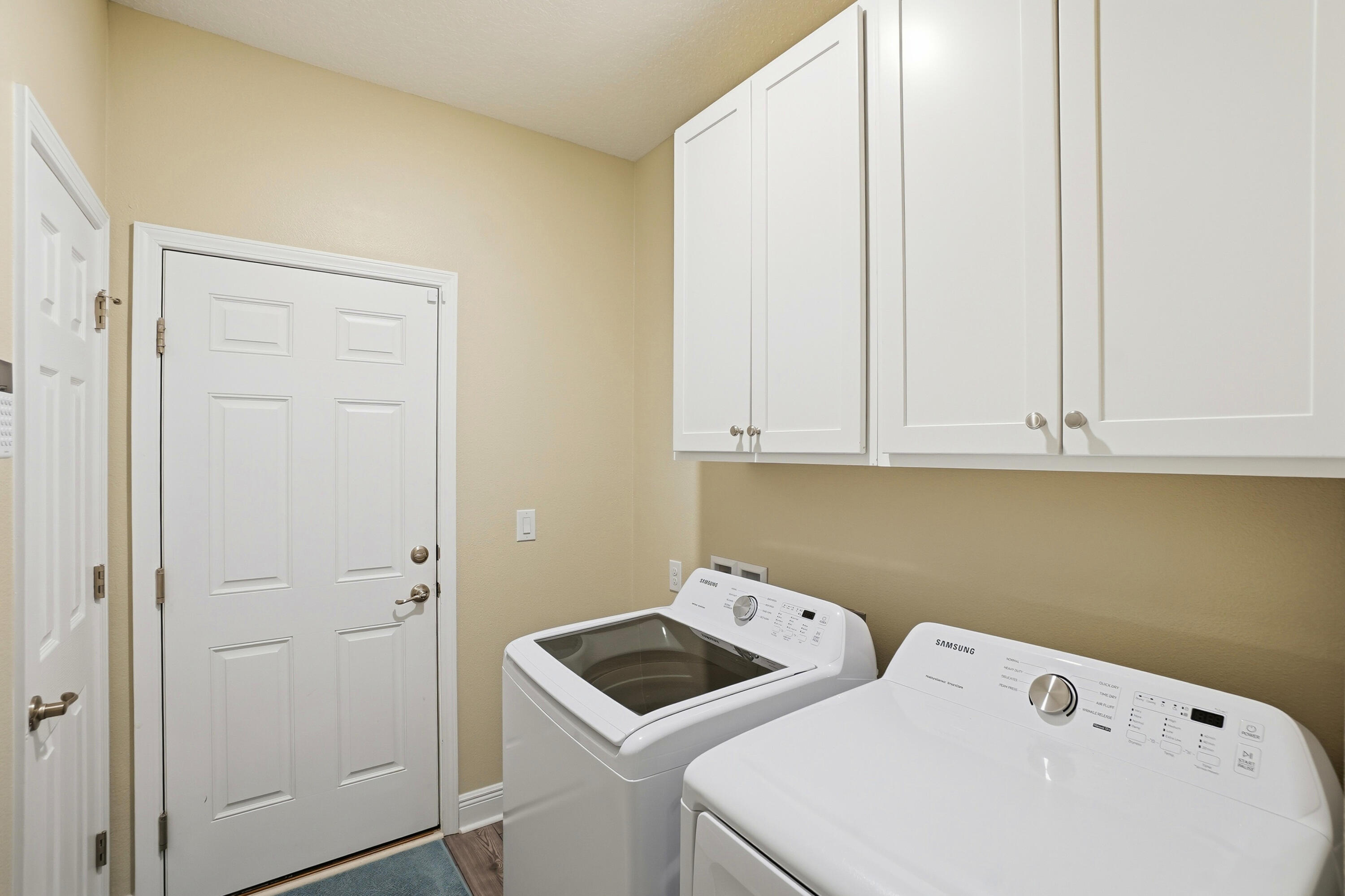 525 Windchime Way Freeport, FL 32439 - Photo 28 of 59 a utility room with dryer and washer