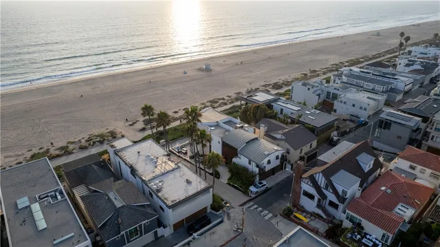 a view of kitchen with sink and natural light