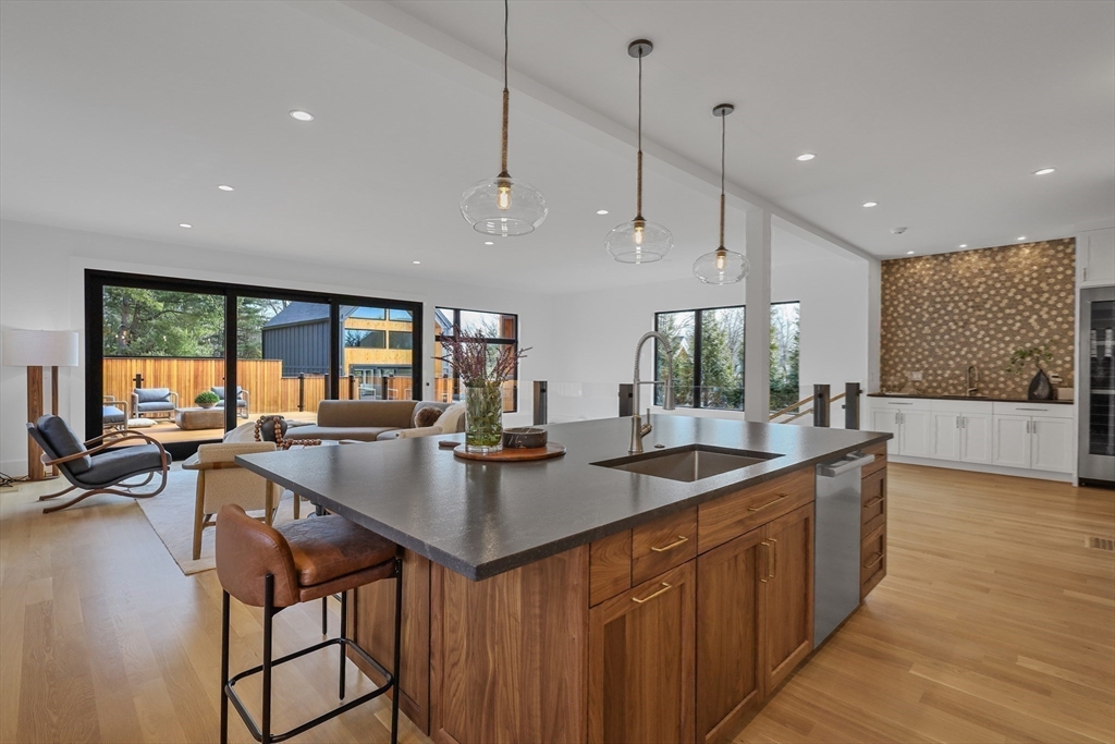 23 Dwight Road Needham, MA 02492 - Photo 15 of 40 a kitchen with stainless steel appliances granite countertop counter space a sink and cabinets