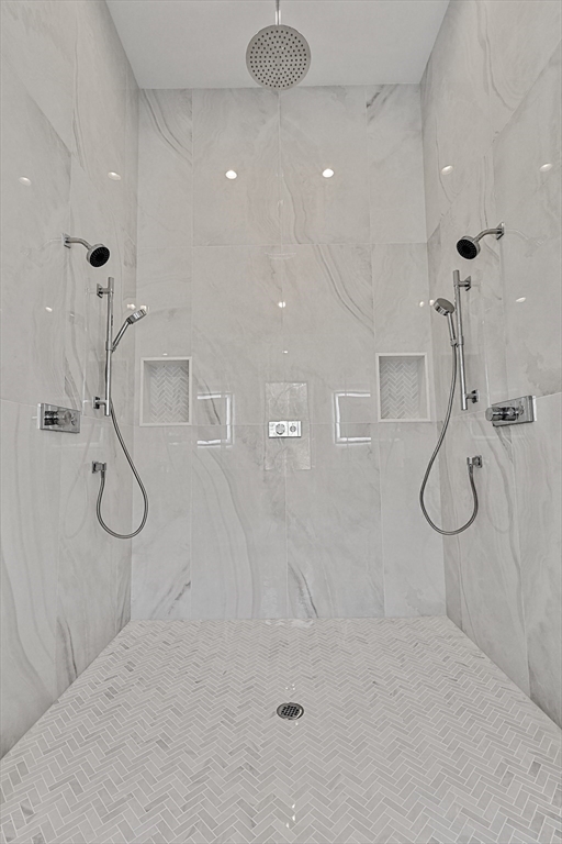 23 Dwight Road Needham, MA 02492 - Photo 26 of 40 a bathroom with a shower