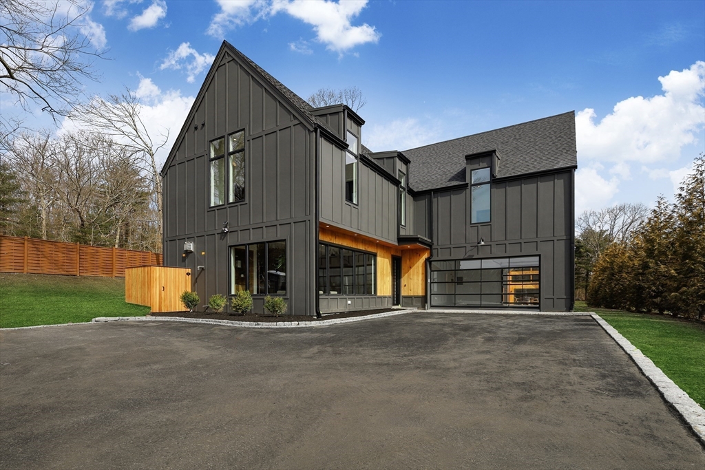 23 Dwight Road Needham, MA 02492 - Photo 3 of 40 a view of house with outdoor space and parking