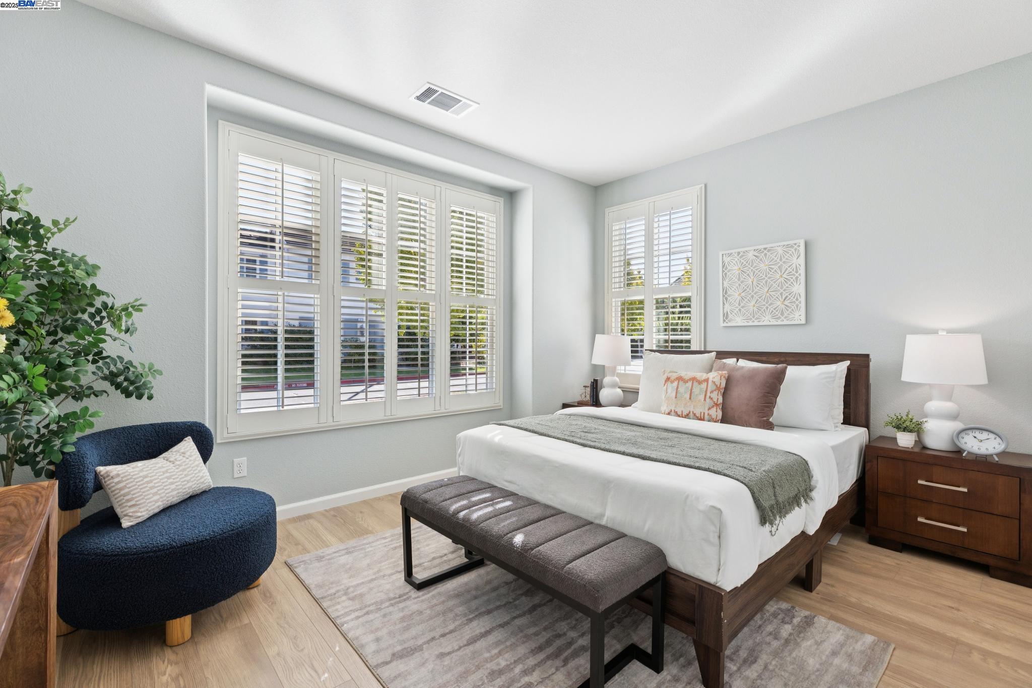 5 Cornelius Square Alameda, CA 94501 - Photo 11 of 60 a spacious bedroom with a bed and a couch