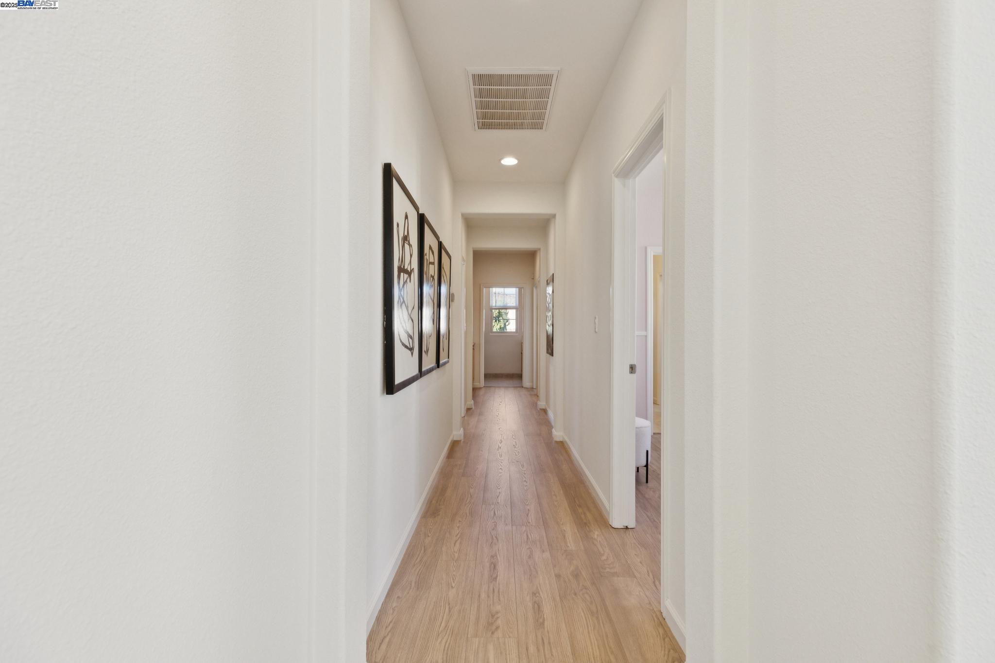 5 Cornelius Square Alameda, CA 94501 - Photo 28 of 60 a view of a hallway with wooden floor