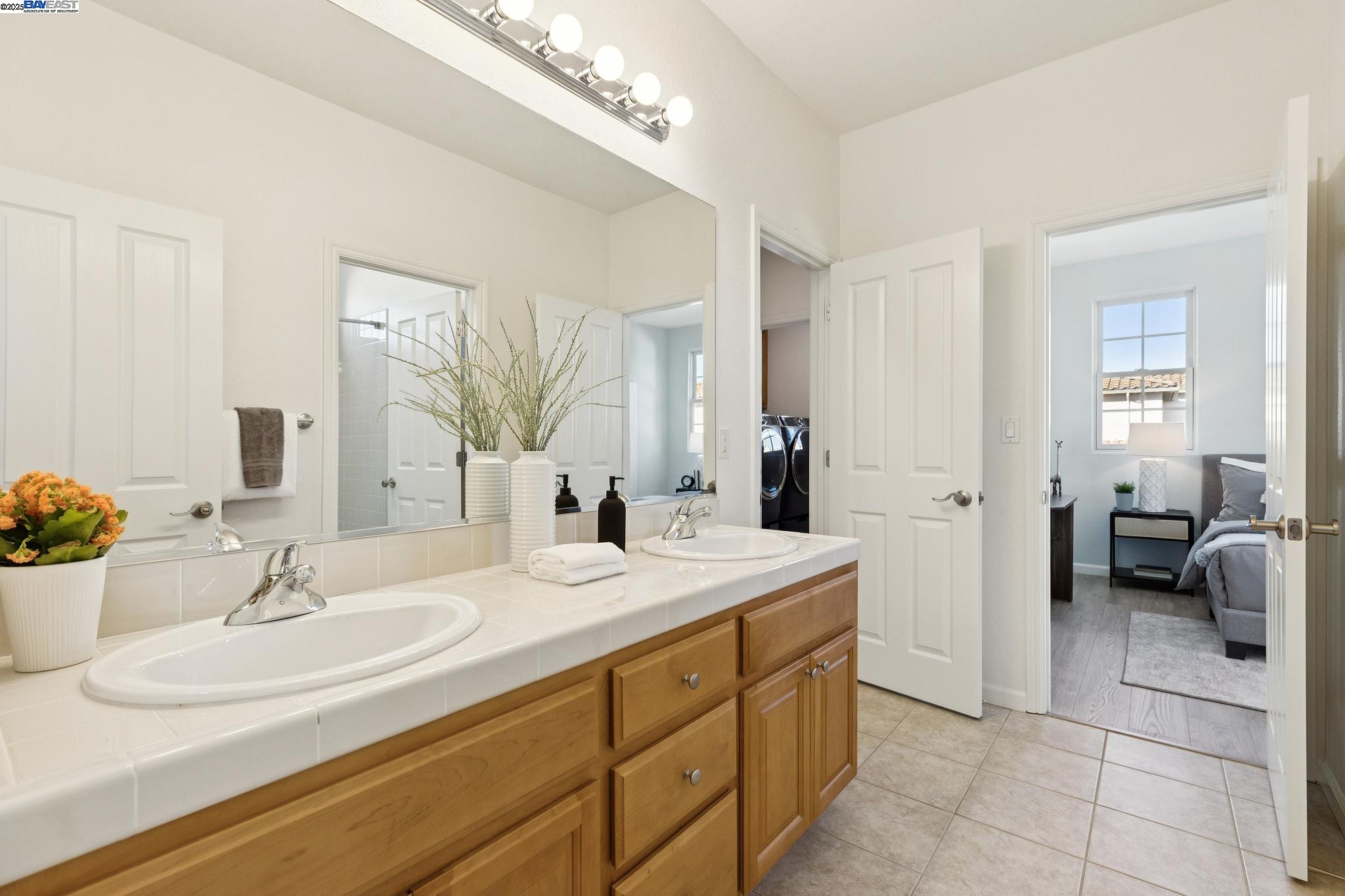 5 Cornelius Square Alameda, CA 94501 - Photo 37 of 60 a bathroom with a sink and a mirror