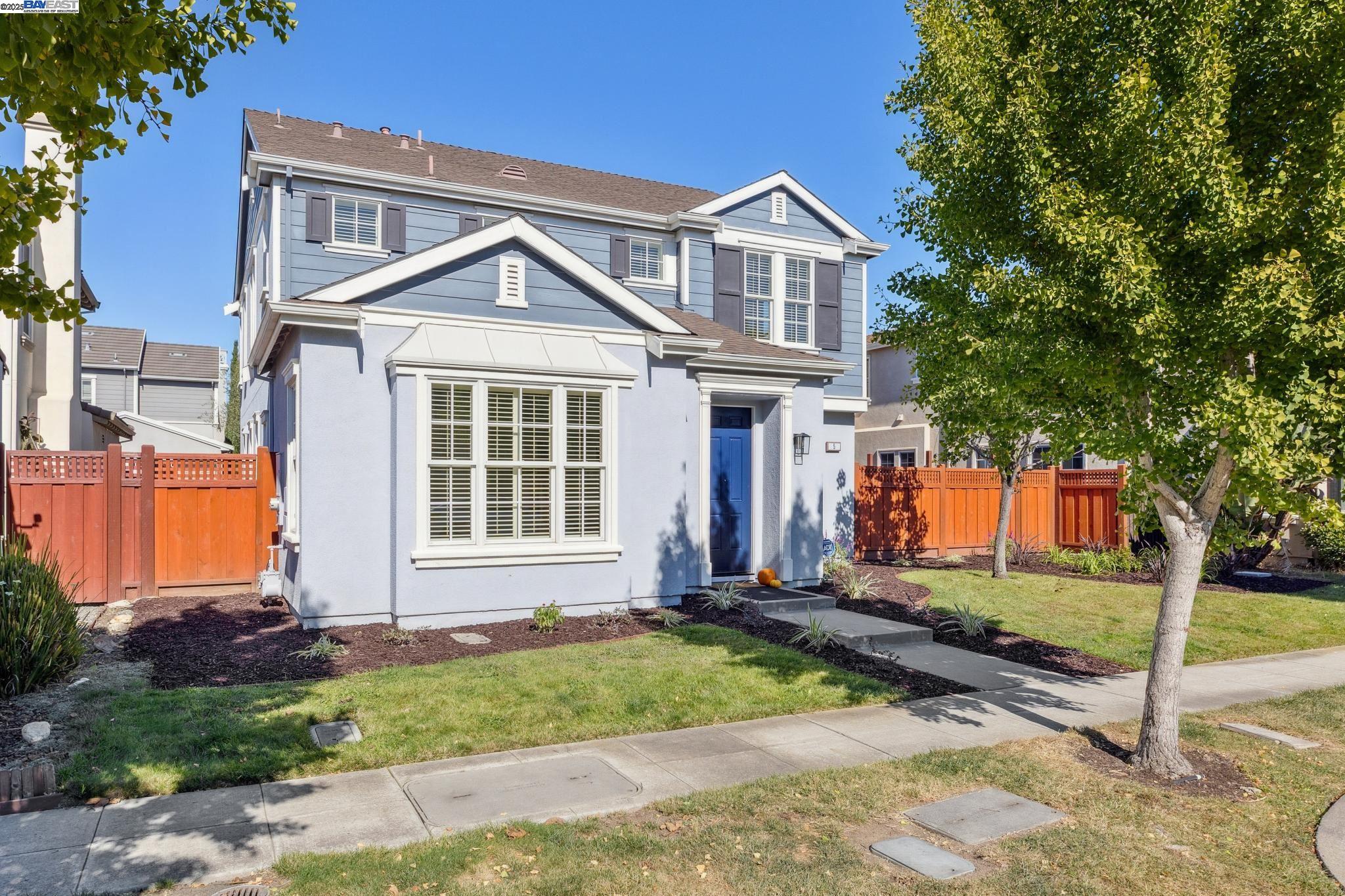 5 Cornelius Square Alameda, CA 94501 - Photo 5 of 60 a front view of a house with a yard and garage