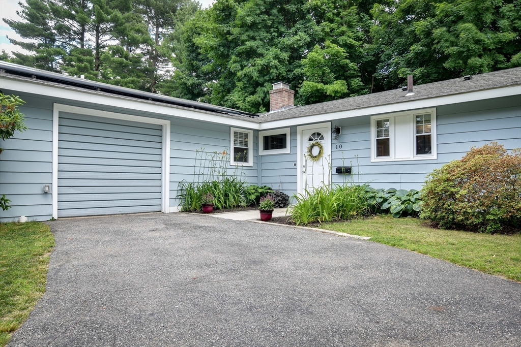 10 Ruth Drive Framingham, MA 01701 - Photo 2 of 28 a view of a house with a yard and garage