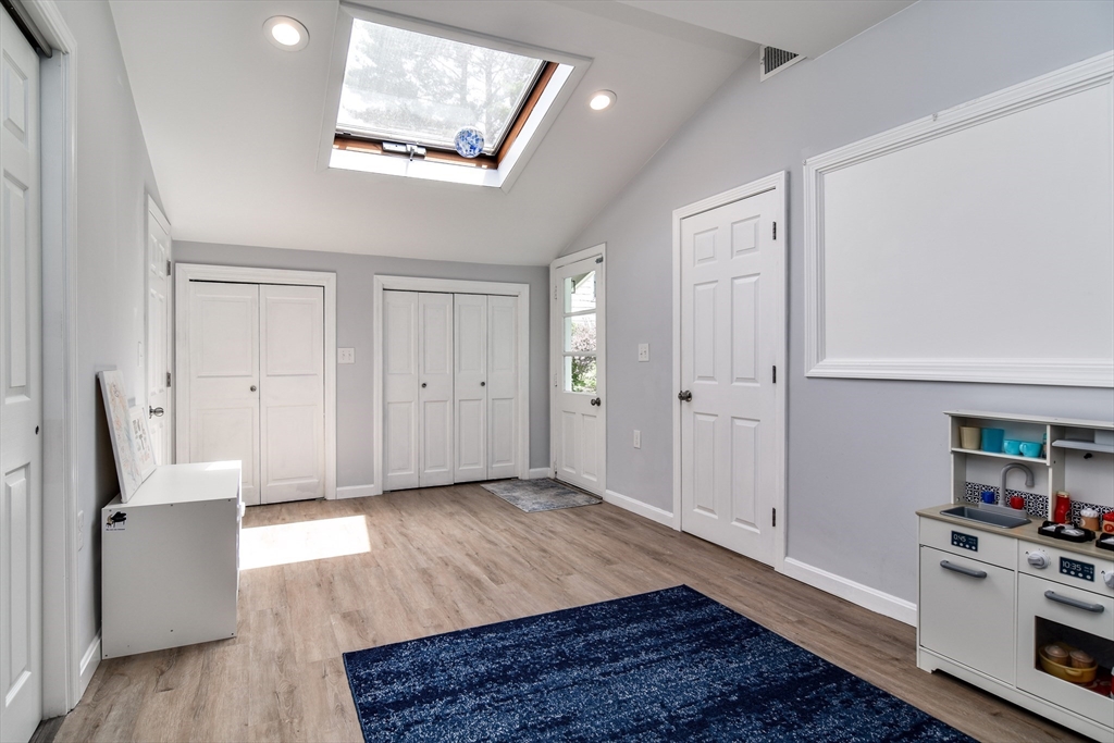 10 Ruth Drive Framingham, MA 01701 - Photo 21 of 28 wooden floor with white walls