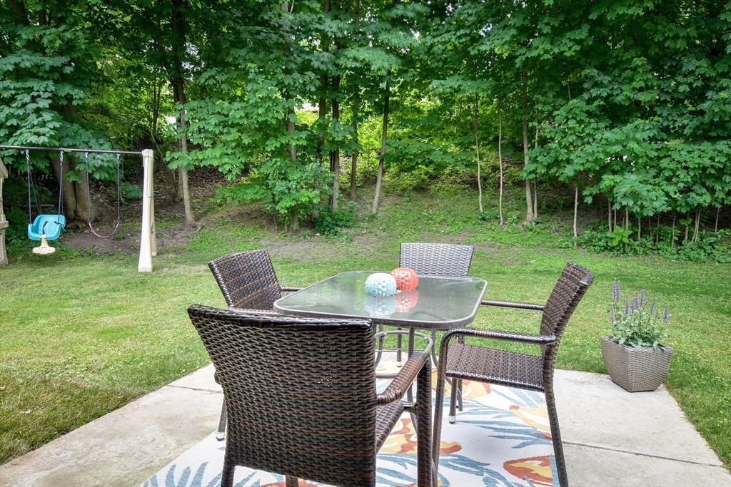 10 Ruth Drive Framingham, MA 01701 - Photo 24 of 28 a view of a chairs and table in the garden