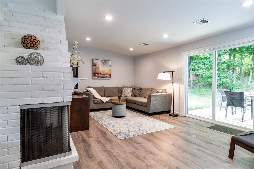 10 Ruth Drive Framingham, MA 01701 - Photo 4 of 28 a living room with furniture and a fireplace