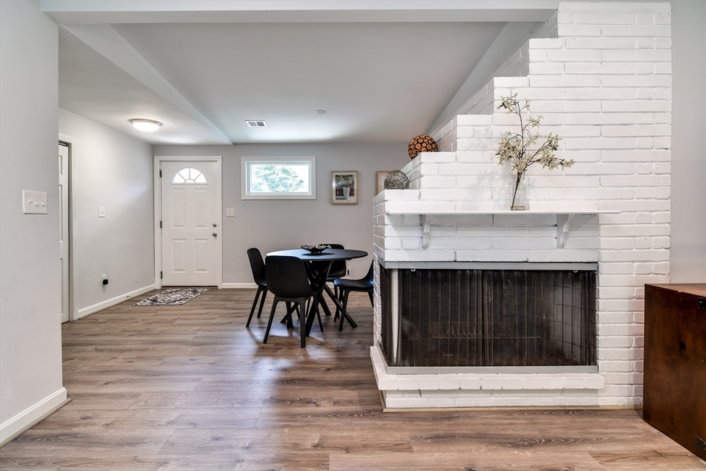 10 Ruth Drive Framingham, MA 01701 - Photo 7 of 28 a view of a livingroom with furniture and fireplace