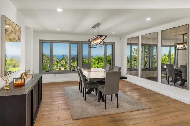 a stove top oven sitting inside of a kitchen