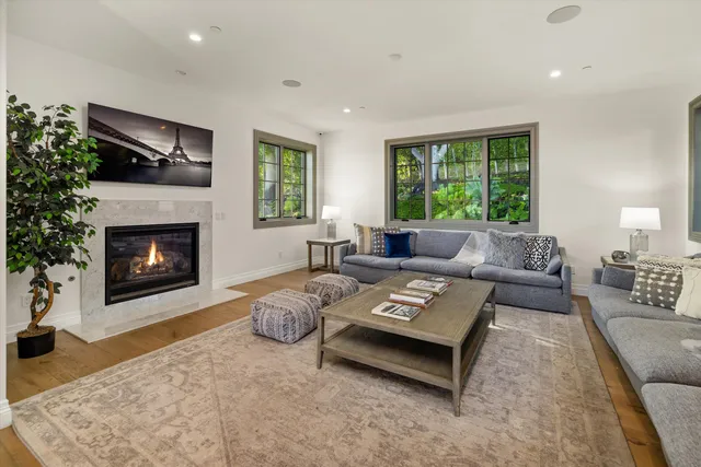 a bed room with a bed window and a table