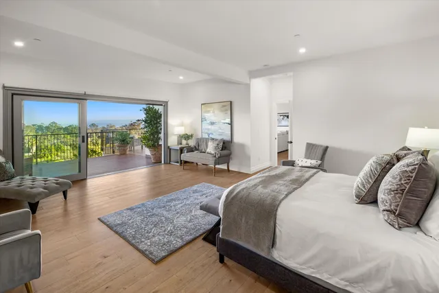 a white bath tub sitting in a bathroom