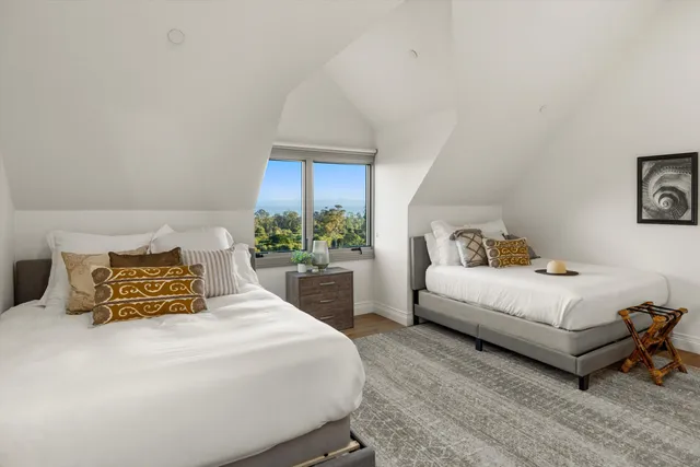 an aerial view of a house with a garden