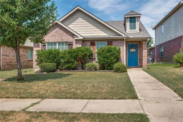 front view of a house and a yard