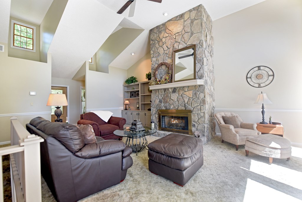 382 Pat Colwell Road Blairsville, GA 30512 - Photo 31 of 42 a living room with furniture and a fireplace