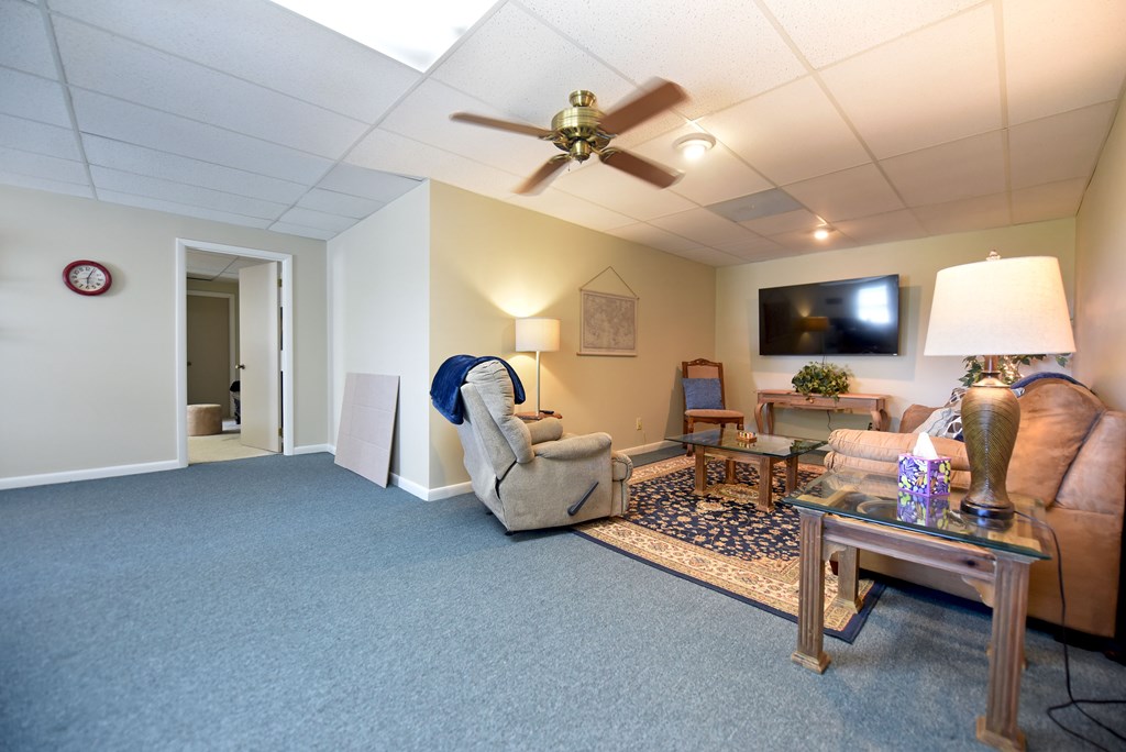 382 Pat Colwell Road Blairsville, GA 30512 - Photo 32 of 42 a living room with furniture and a flat screen tv