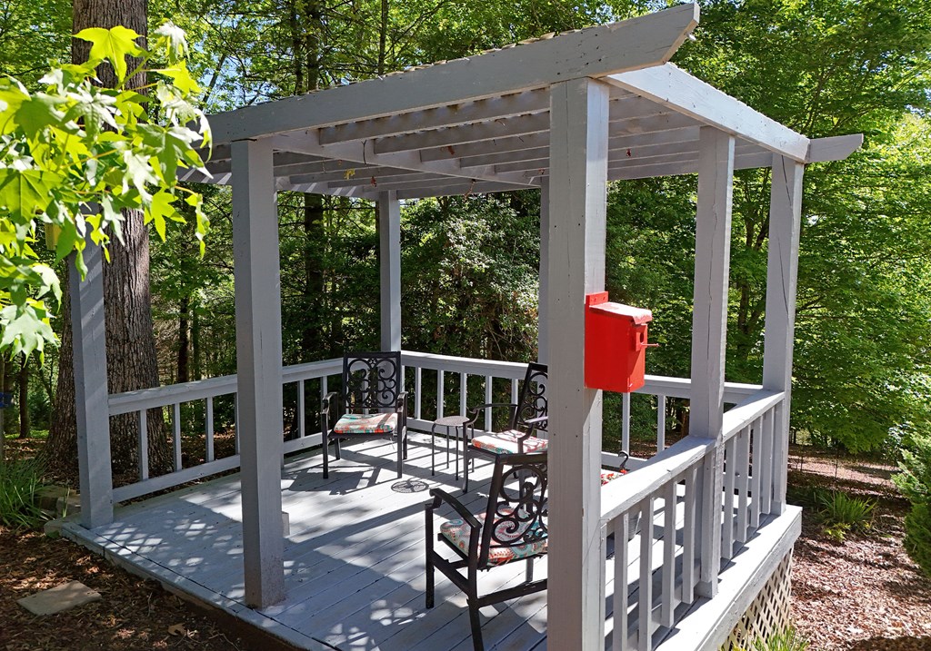 382 Pat Colwell Road Blairsville, GA 30512 - Photo 39 of 42 a view of a wooden deck and a backyard