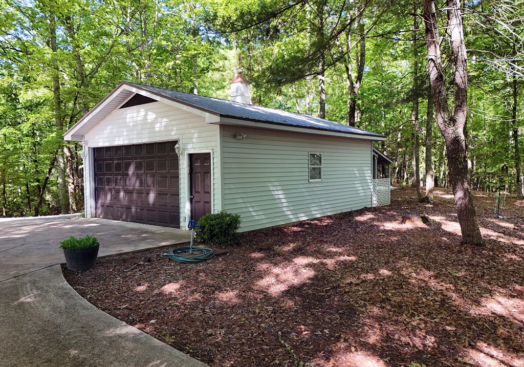 382 Pat Colwell Road Blairsville, GA 30512 - Photo 10 of 42 a view of a house with a yard and large tree