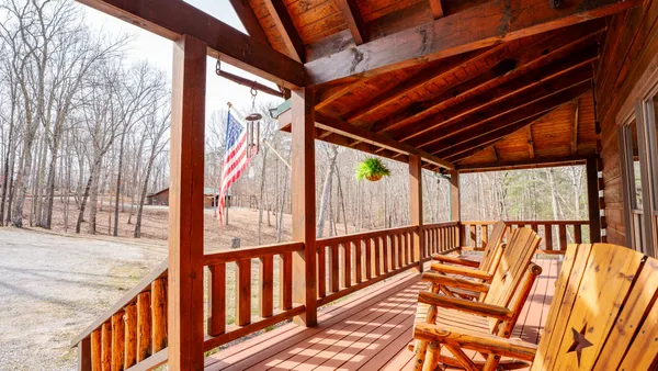 a view of balcony with wooden floor