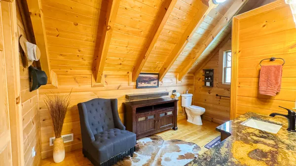 a view of a bathroom with a sink and a shower
