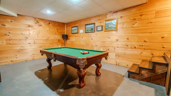 a bathroom with a sink mirror and shower