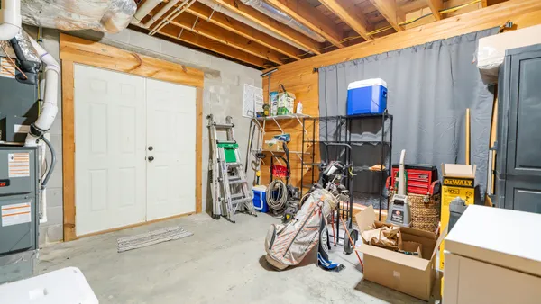 a kitchen with a sink and a refrigerator