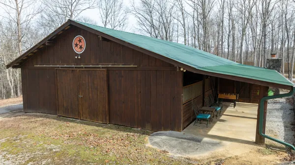 a bathroom with a sink mirror and a shower