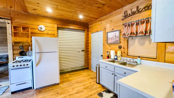 a bedroom with two beds and painted walls