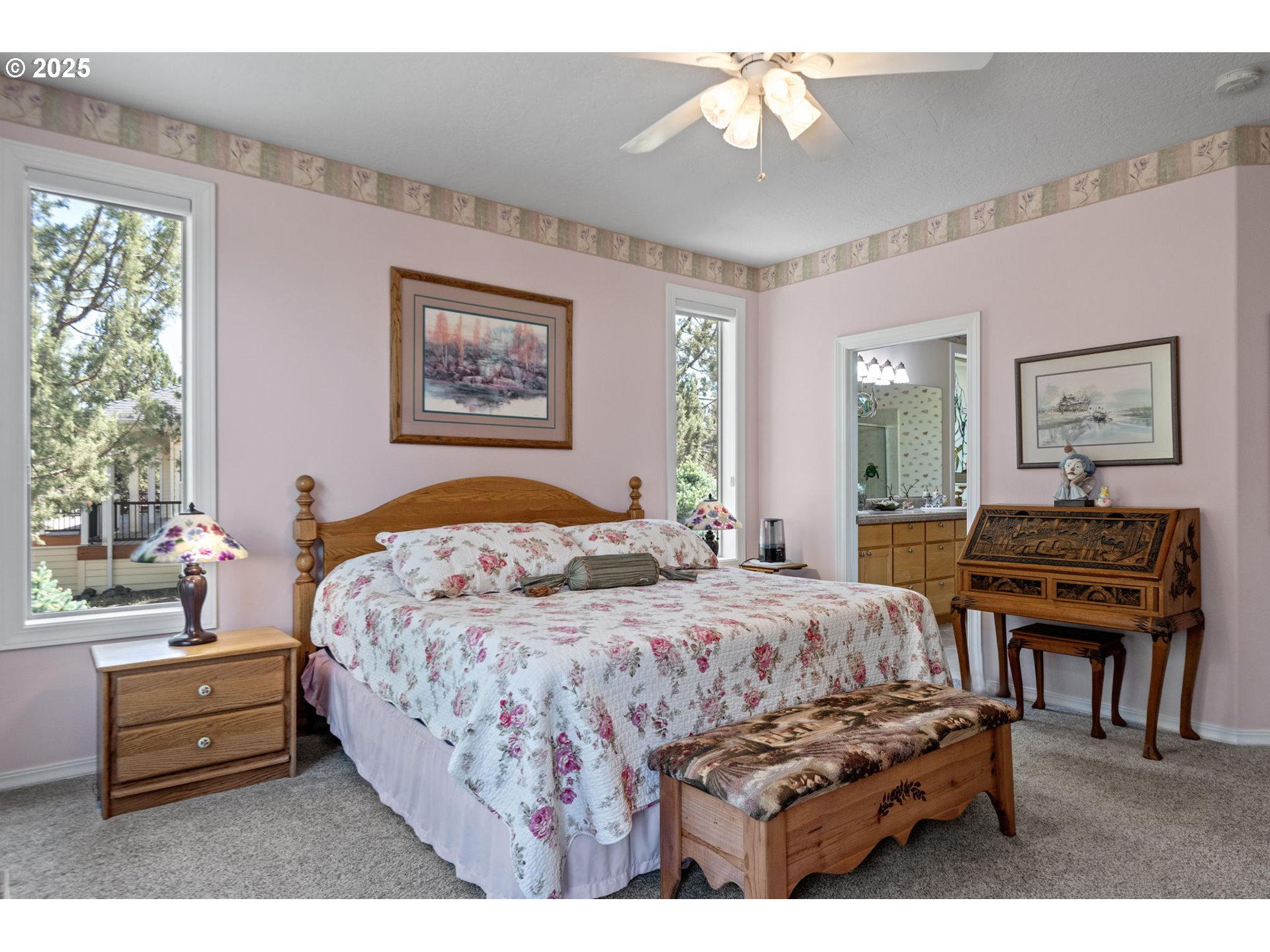 454 Tanager Drive Redmond, OR 97756 - Photo 16 of 31 a bedroom with a bed and a dresser with rug