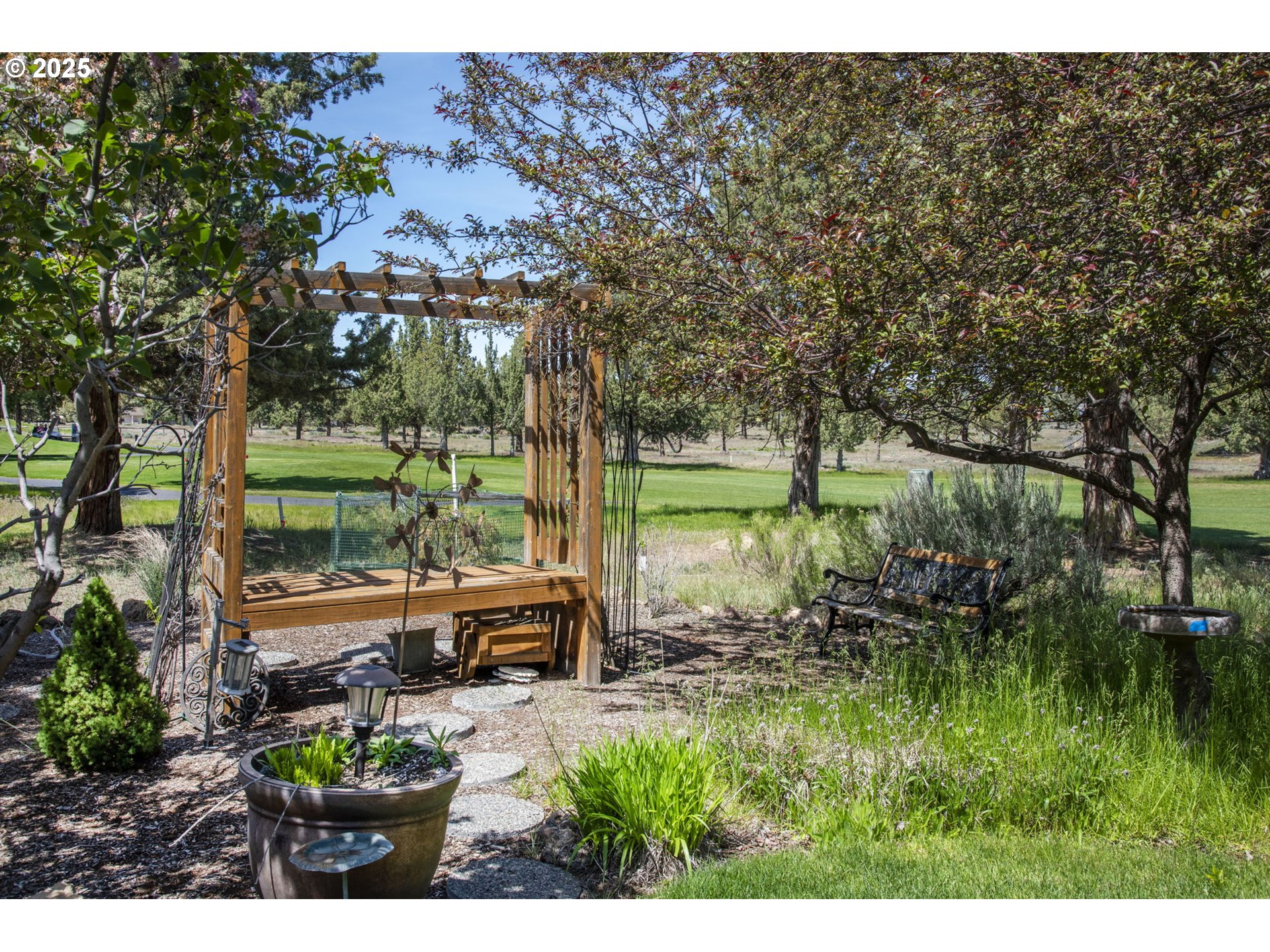 454 Tanager Drive Redmond, OR 97756 - Photo 28 of 31 a view of backyard with outdoor seating and green space