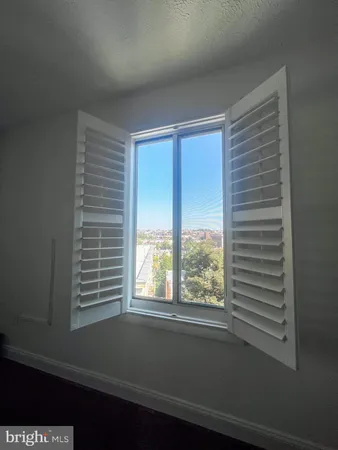 a view of a room that has a window in it