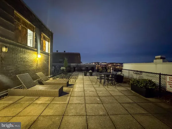 a view of a terrace with chairs