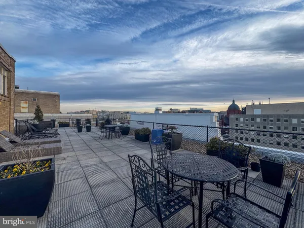 a view of a terrace with seating area