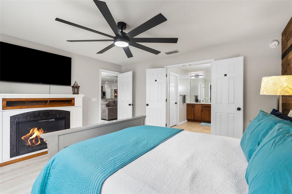 4098 Southwest 47th Court Ocala, FL 34474 - Photo 14 of 44 a bed room with a bed and a television