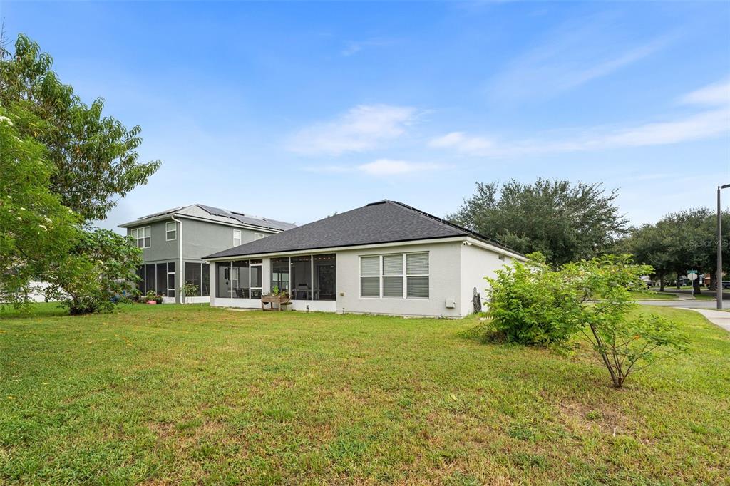 4098 Southwest 47th Court Ocala, FL 34474 - Photo 34 of 44 a front view of a house with a garden