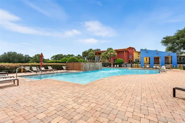 a swimming pool with a yard