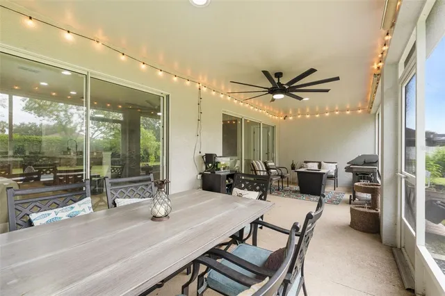 a view of a livingroom with workspace and a couch