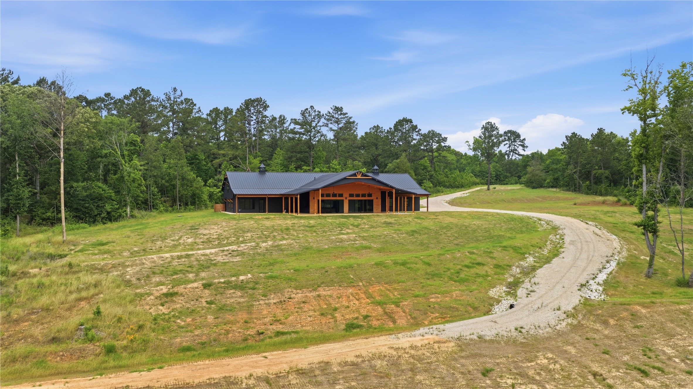 447 County Road 2211 Rusk, TX 75785 - Photo 15 of 50 a view of a house with a yard