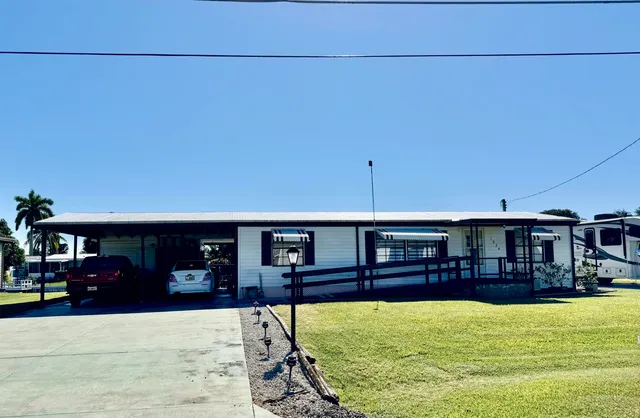 a view of a house with swimming pool