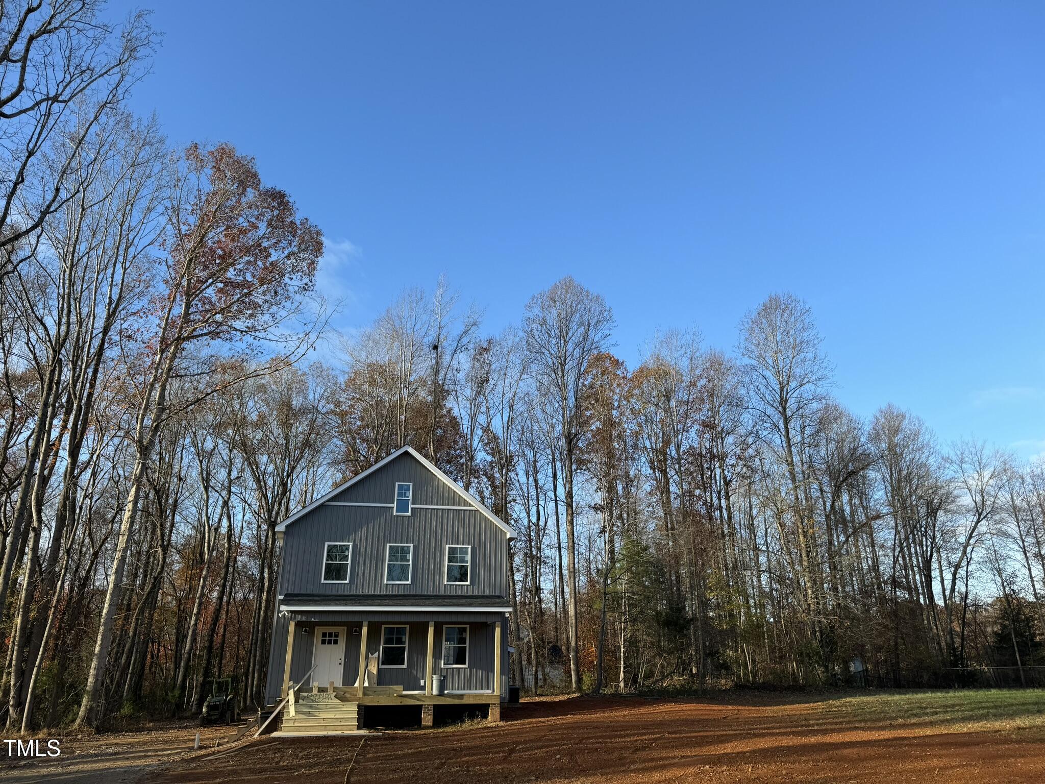 a view of houses with a street