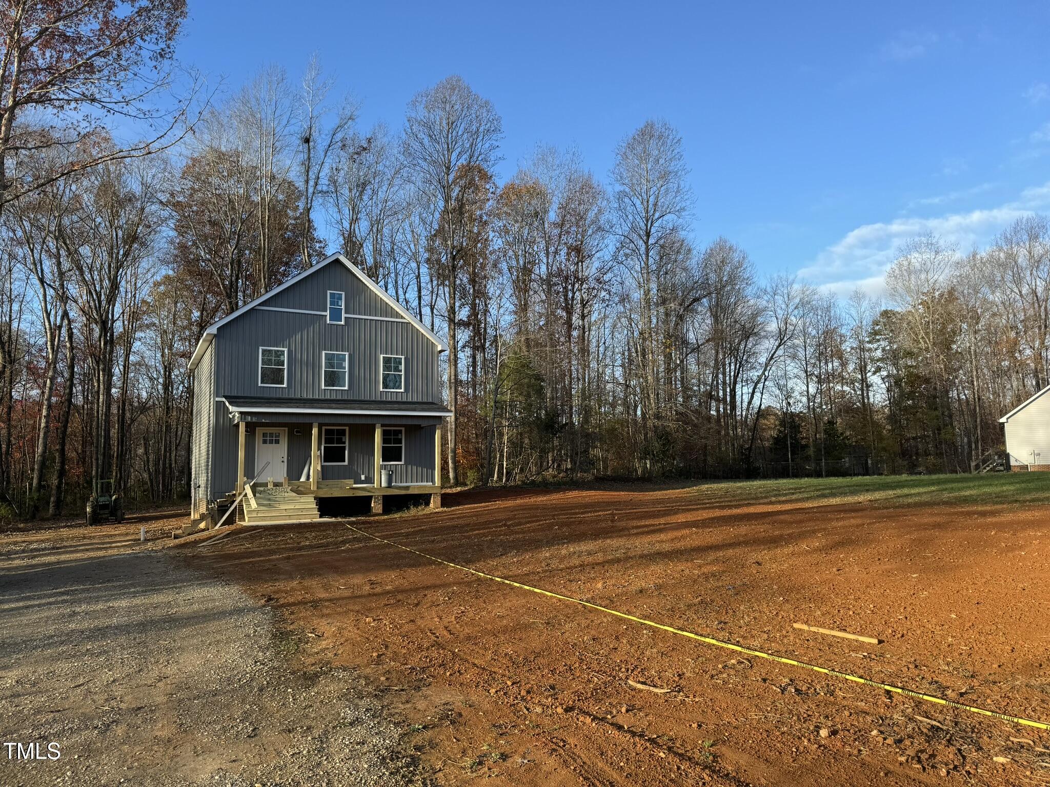 9518 Meredith Drive Rougemont, NC 27572 - Photo 3 of 12 a front view of a house with a yard